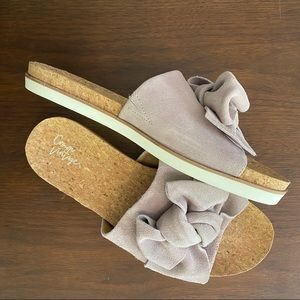 Dressy slip on sandals with bow and cork footbed